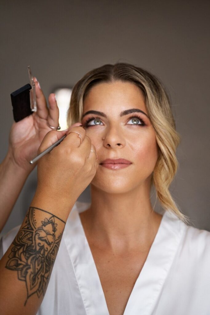 Bride getting makeup